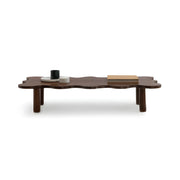 The Edith Curvy Wood Coffee Table with a modern and elegant design, perfect for contemporary spaces.